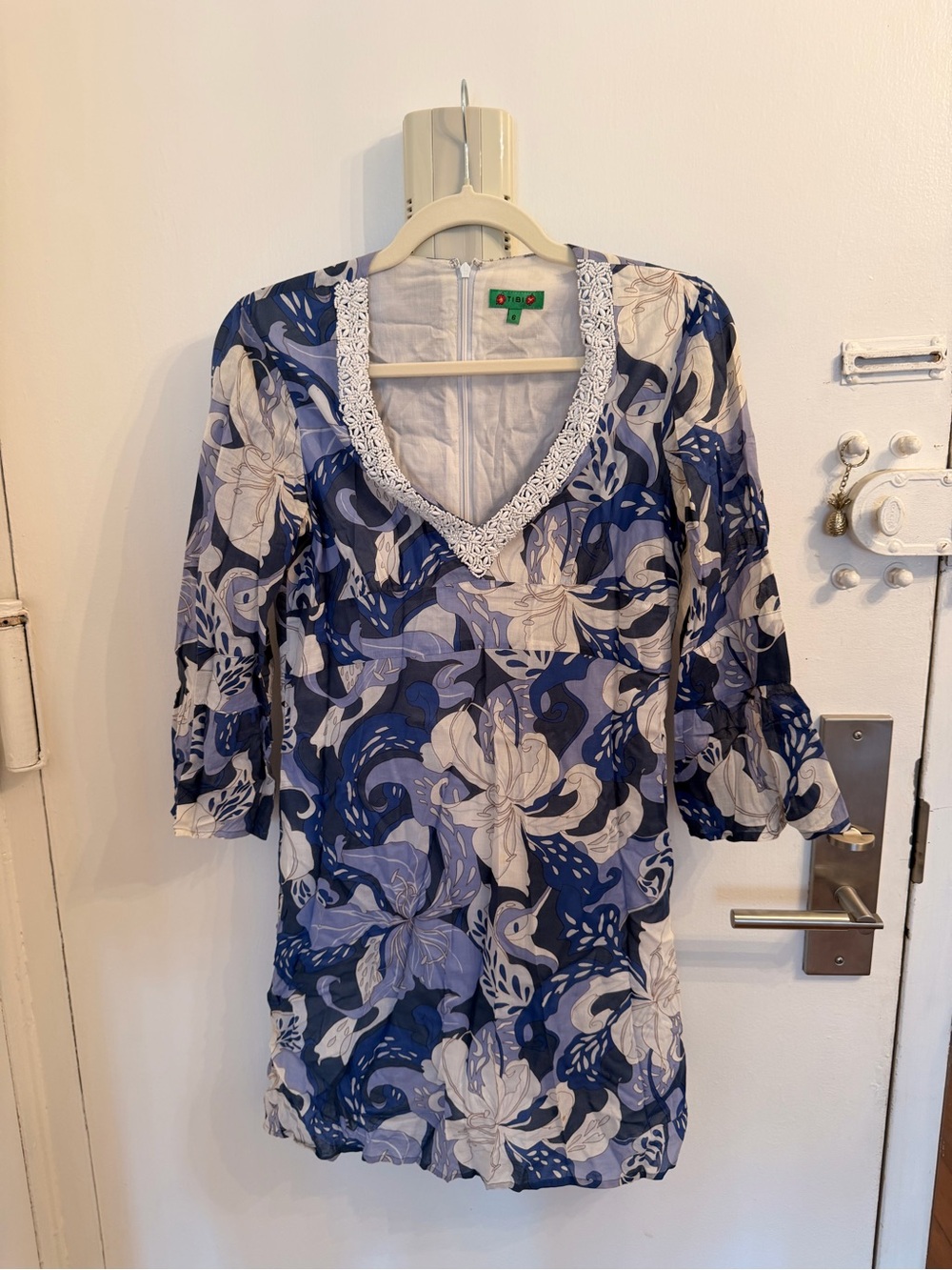 Tibi White Dress with Green Brand Tag and Red Floral Accents
